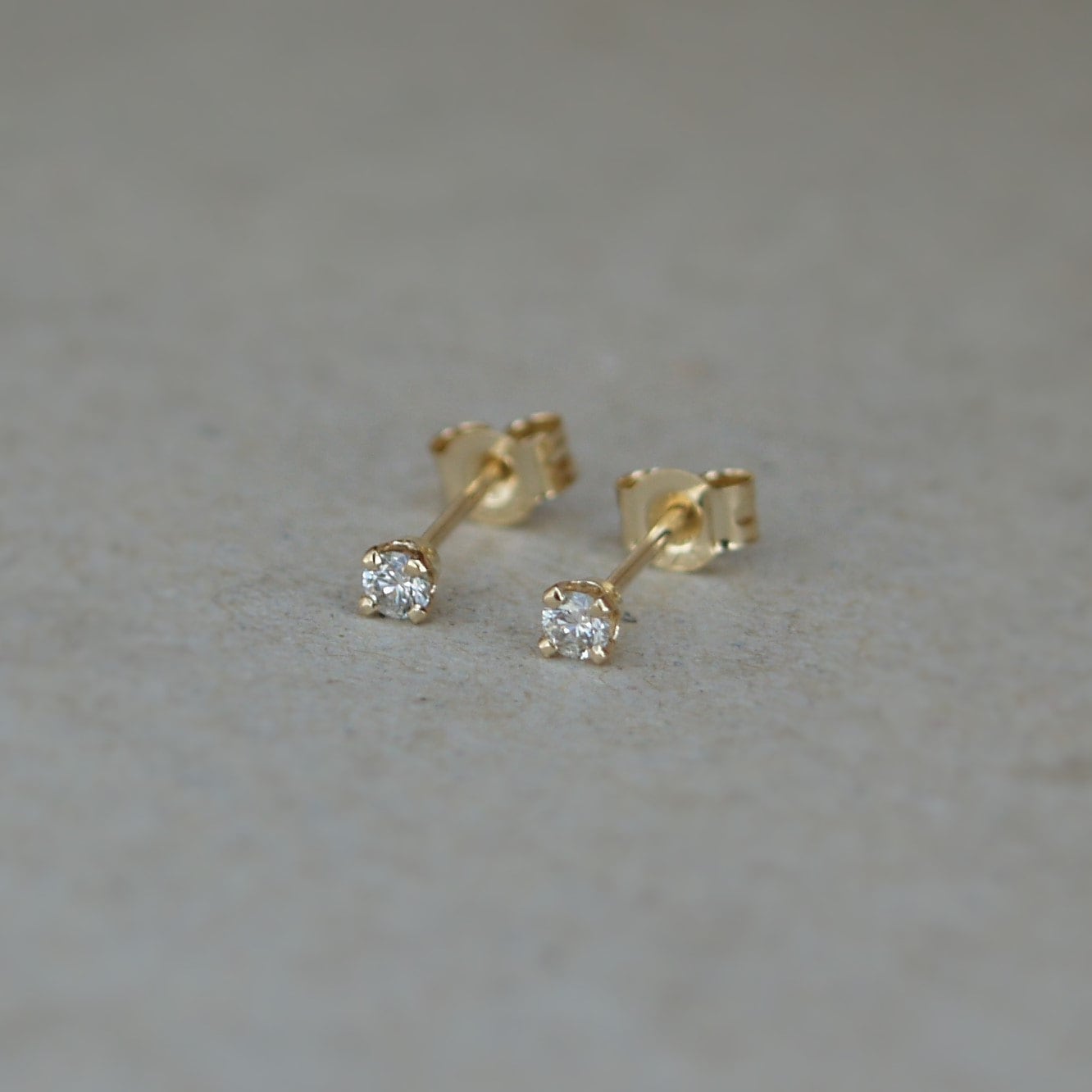 9ct yellow gold tiny 2.mm natrual diamond claw set stud earrings