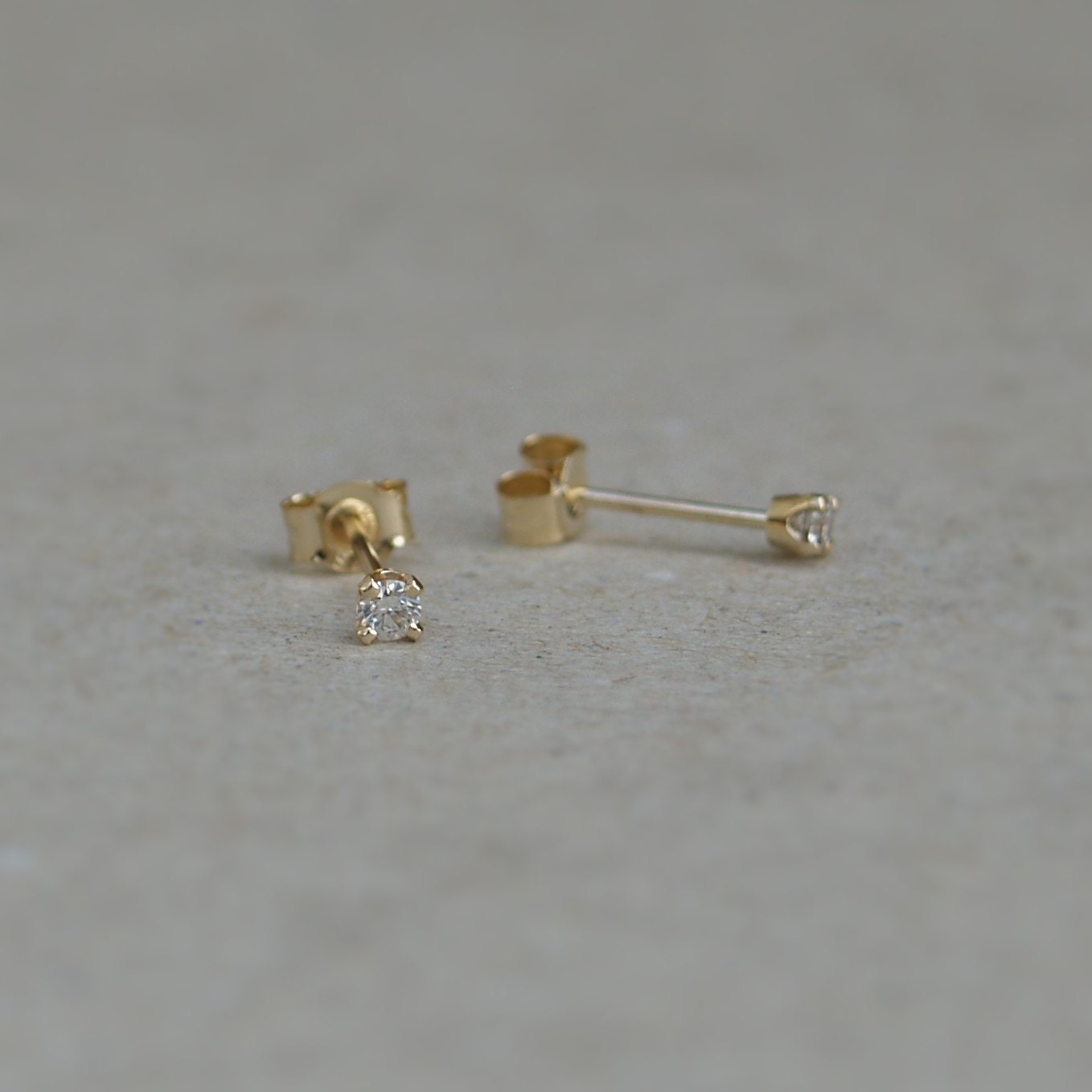 9ct yellow gold tiny 2.mm natrual diamond claw set stud earrings