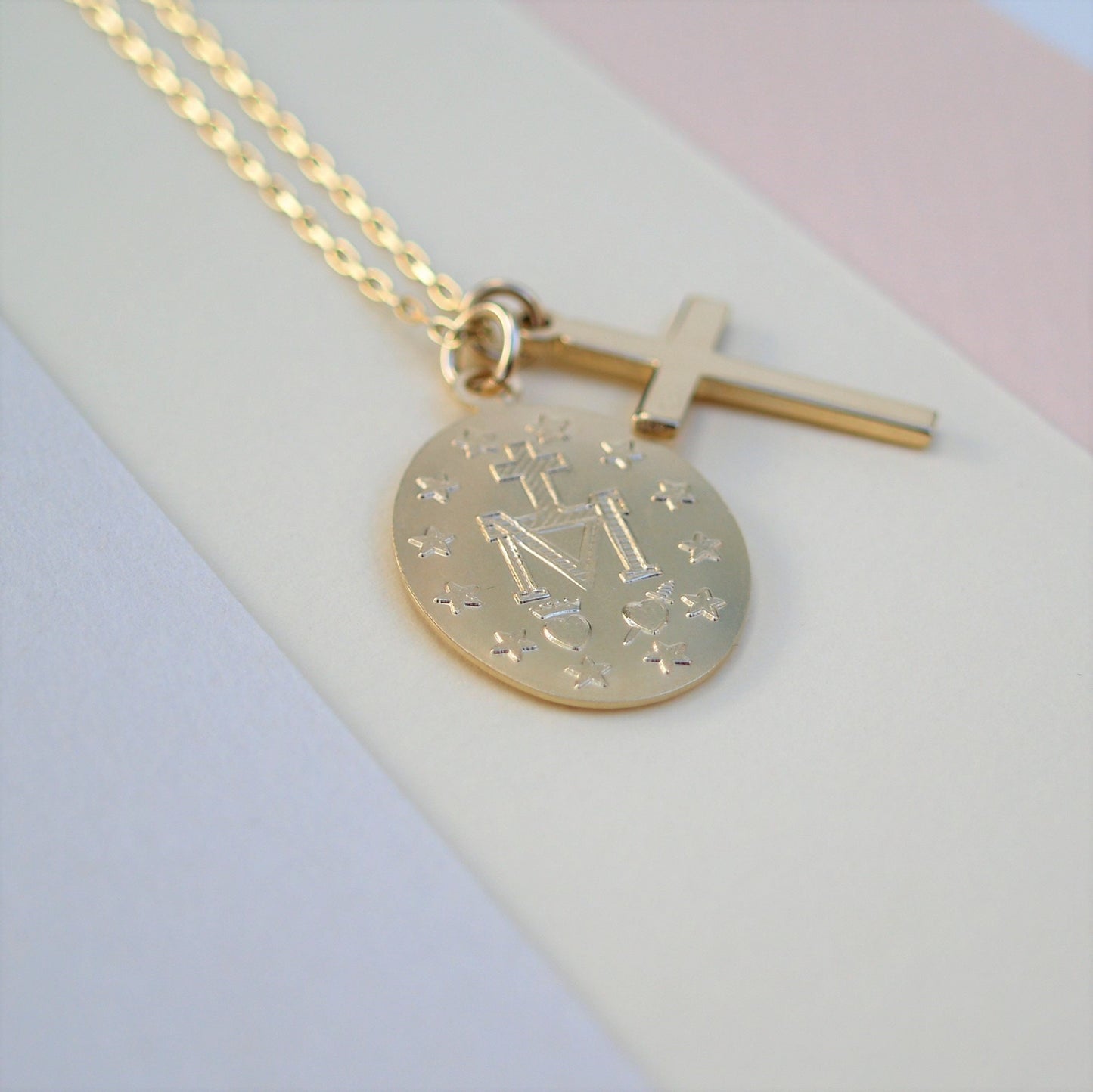 9ct solid yellow gold small cross and large size Miraculous Mary oval medal pendant on a 1.1mm wide diamond cut trace chain