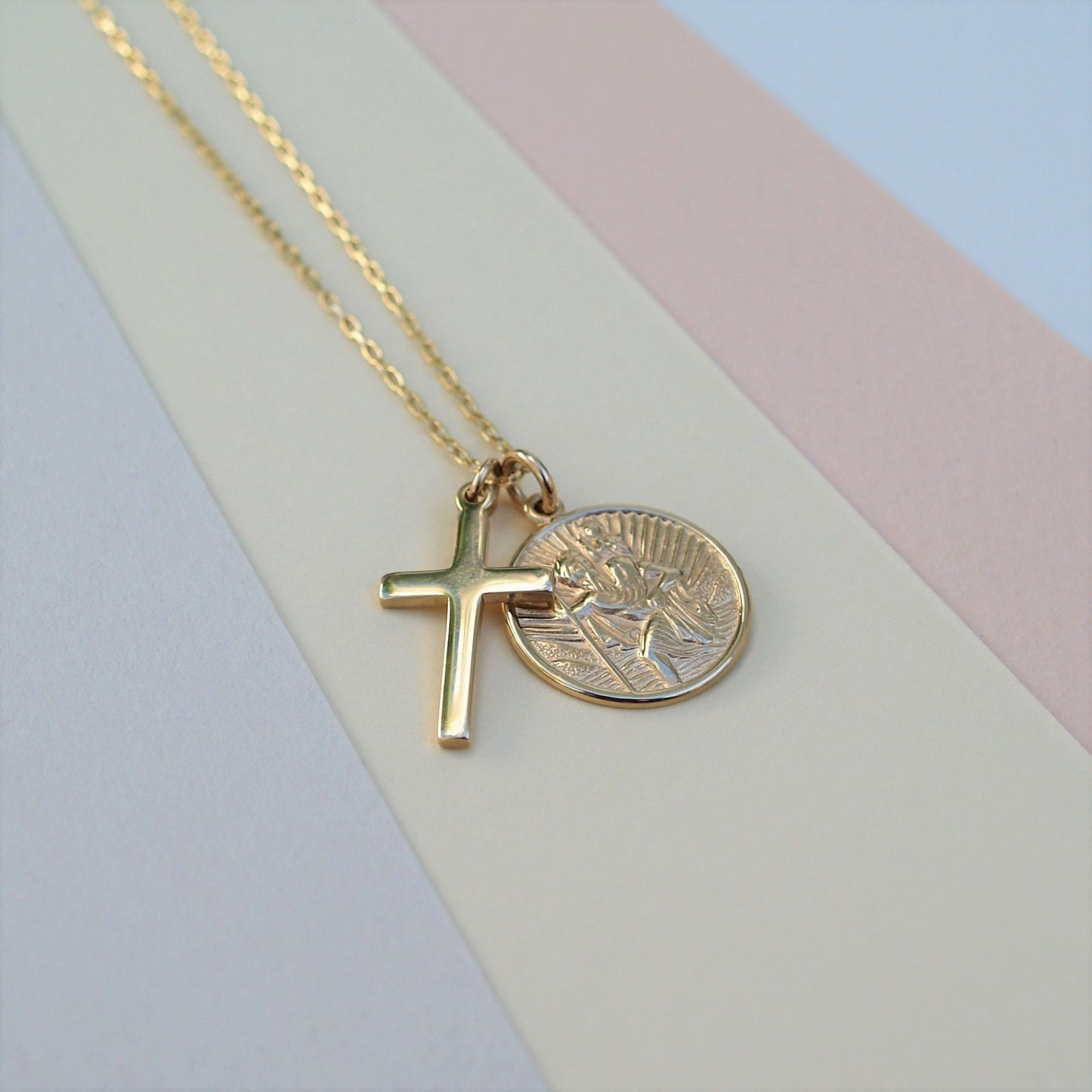 9ct solid yellow gold Saint Christopher and small cross pendant on a 1.1mm wide diamond cut trace chain