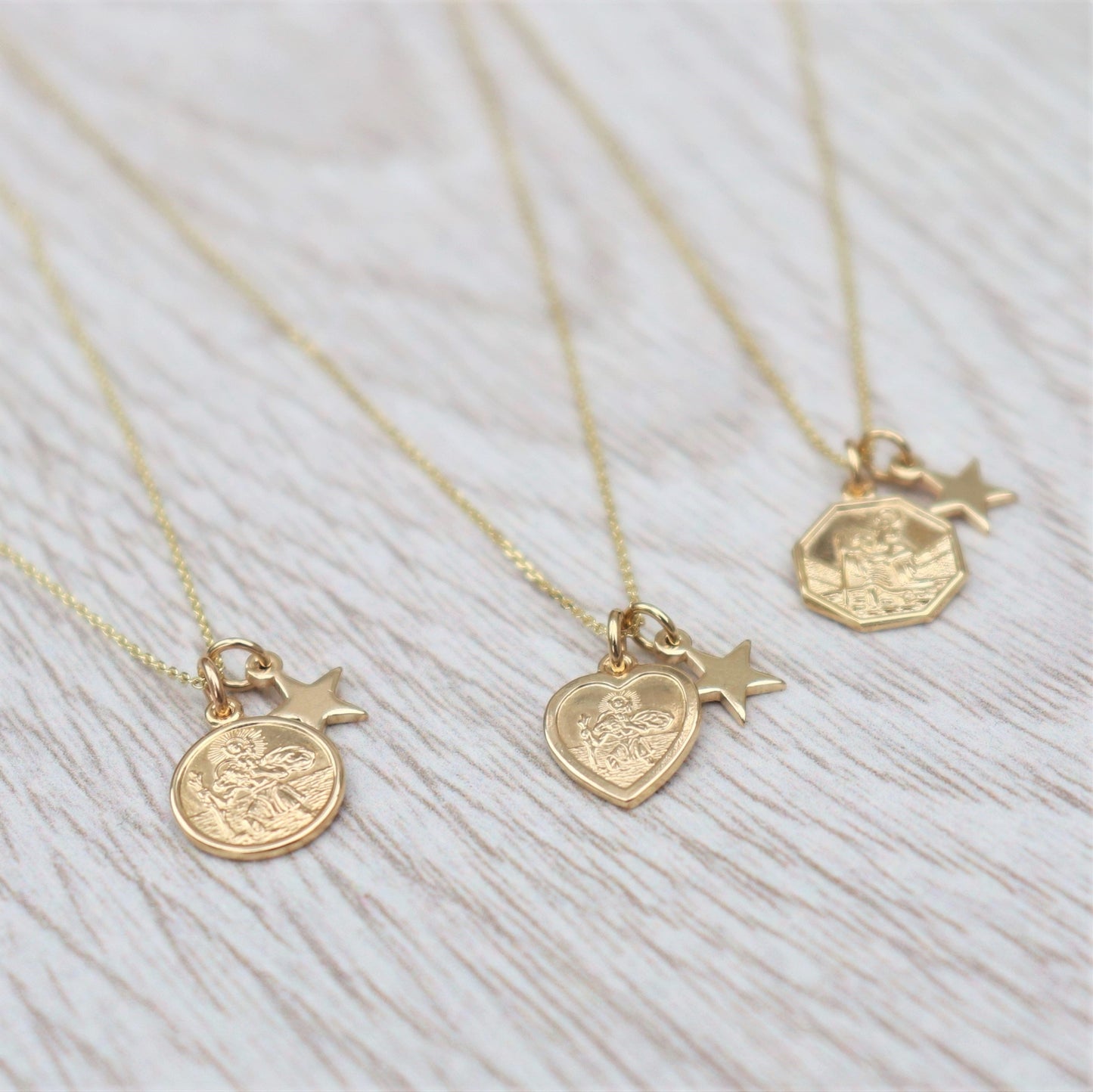 9ct solid yellow gold dainty saint christopher and tiny star pendant on a fine chain
