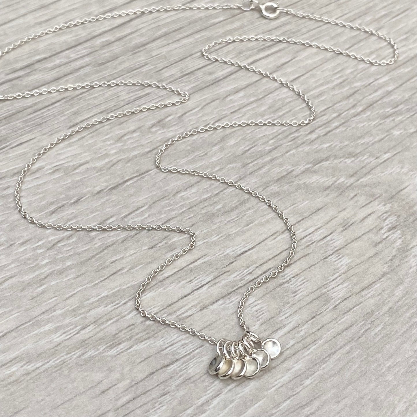 Handmade to order - Solid silver six tiny petal charm pendants on a 1.2mm wide trace chain