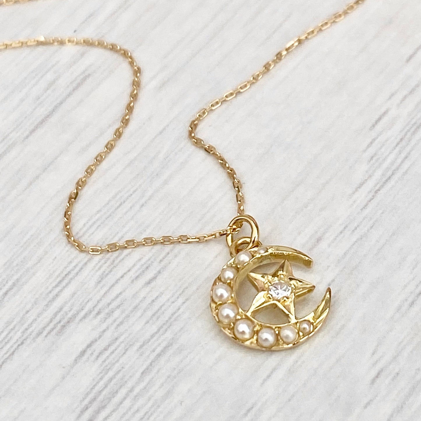 Vintage 18ct yellow gold seed pearl diamond star crescent pendant on a fine new 18ct yellow gold chain