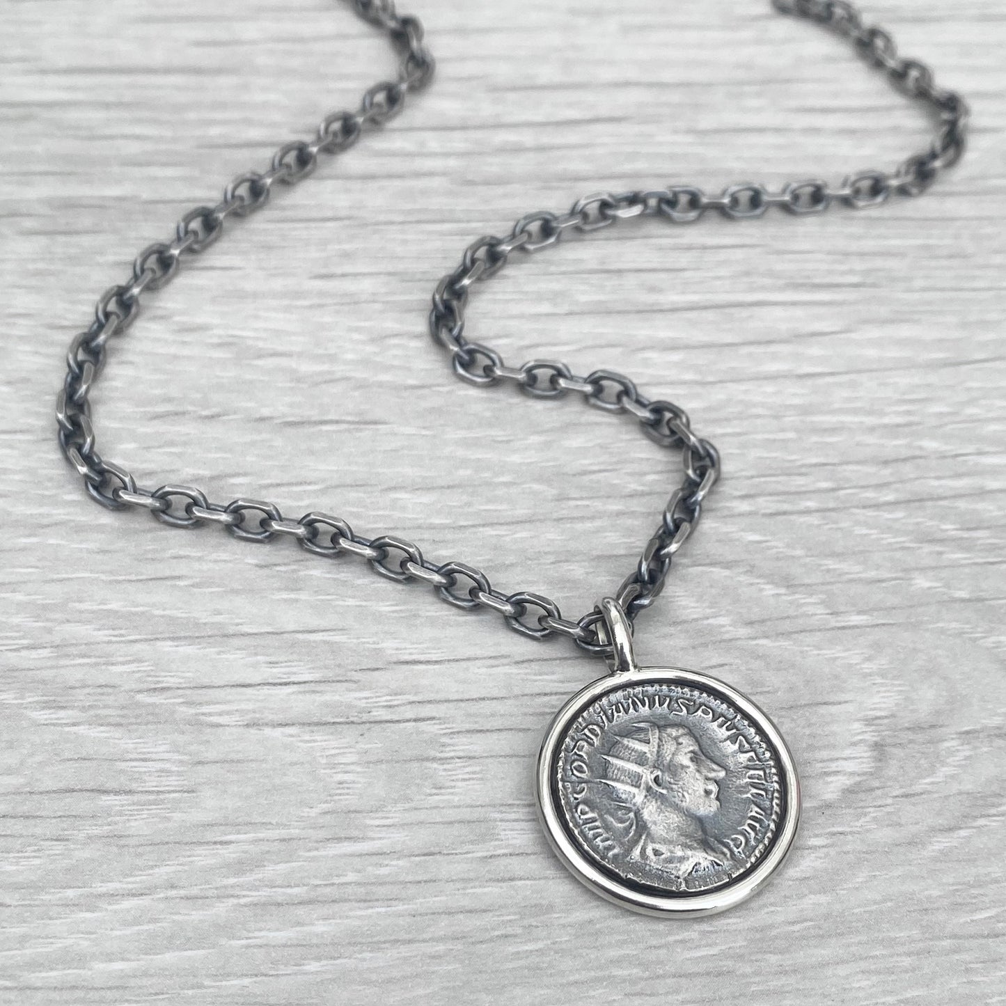 Handmade to order - Oxidised solid Sterling silver 23mm replica Roman coin circle framed pendant on a choice of trace or round box chain